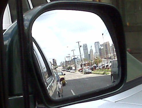 Downtown Birmingham in my side view mirror