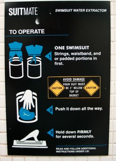 Sign at Swimsuit Water Extractor